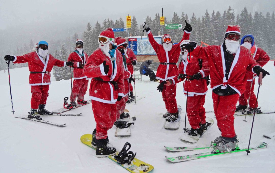 A bevy of Santas collaborate at Brighton Ski Resort, UT. Credit: Harriet Wallis