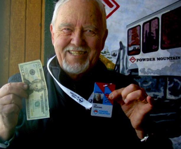 Reviewer Jan gleefully shows off his $20 season pass for 75+ skiers. Credit; Jan Brunvand