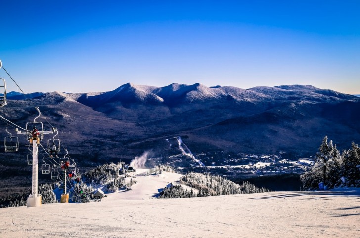 Magnificent views provide a backdrop for senior friendly skiing at Waterville Valley Resort. Credit: Waterville Valley Resort