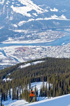 View of Revelstoke town, the valley, Columbia River and Monashees Mountains from the top of Revelstoke ski slope.