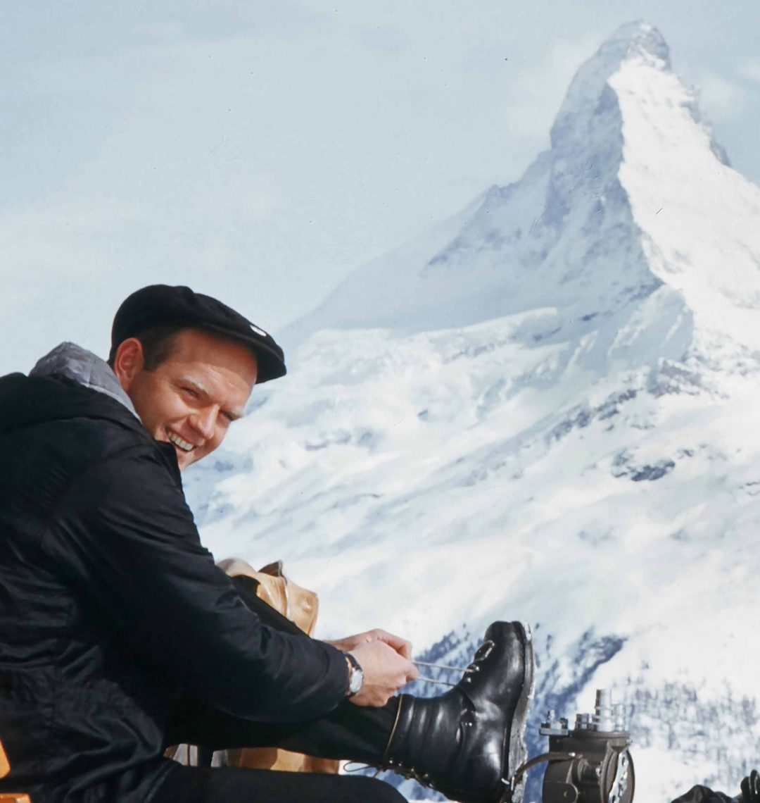 Ski Pioneer Film-Maker Warren Miller lacing up at the Matterhorn. His beautiful and fun-filled films brought new people to skiing in the 60s and 70s. The WME company continues to produce over the top visual feasts.