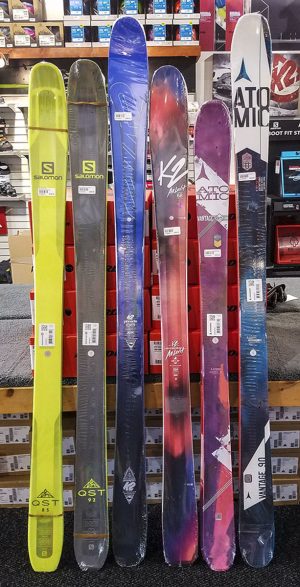 Examples of tapered tail skis. Wide shovels, slightly narrow waists but tails that don't flare out as much as classic shaped skis do. Credit: Yvette Cardozo