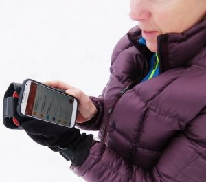 Are Smartphones an insidious barrier to socializing on the slopes?  Credit: Harriet Wallis