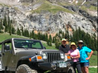 Jeep, Jon, Pam, and April high above Our, Colorado. Mark is behind the lens.