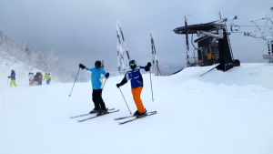 Skiiers at top of lift