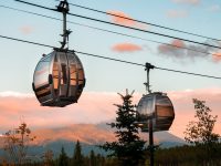 A sunset shot of two gondolas in Steamboat, CO Photo by Phoenix Dorninger on Unsplash